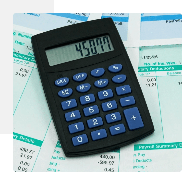 A calculator sitting on top of some paper.